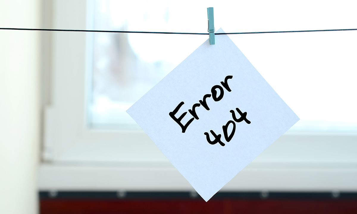 Error 404, written on paper